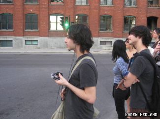 Julian and Max Stein (from left) helped record their first participatory sound walk, led by Communication studies professor Andra McCartney.